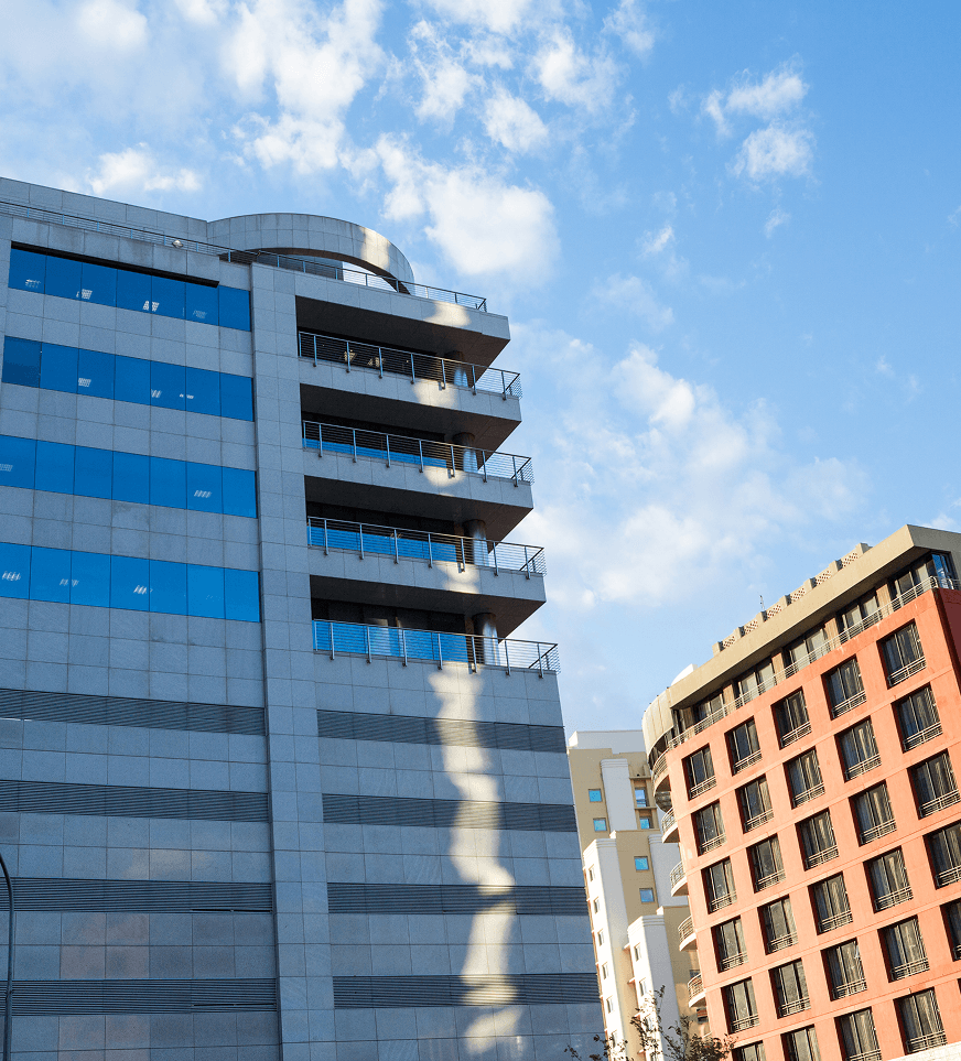 Modern commercial building against blue sky